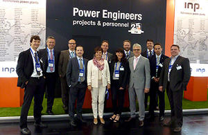 The team of INP in front of the booth at PGE 2014